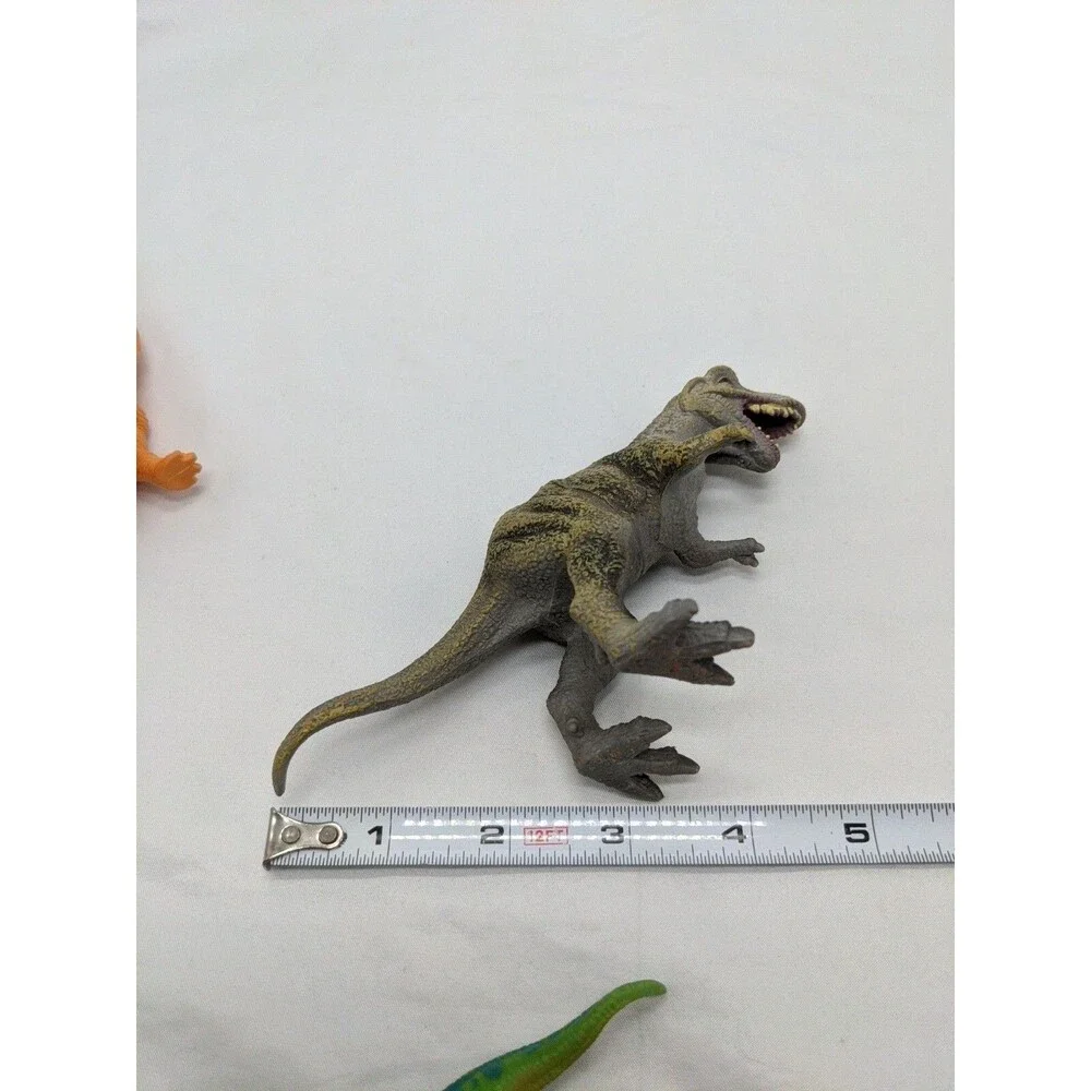 Lot Of (7) Dinosaur Toys Trex Stegasaurs Triceratops